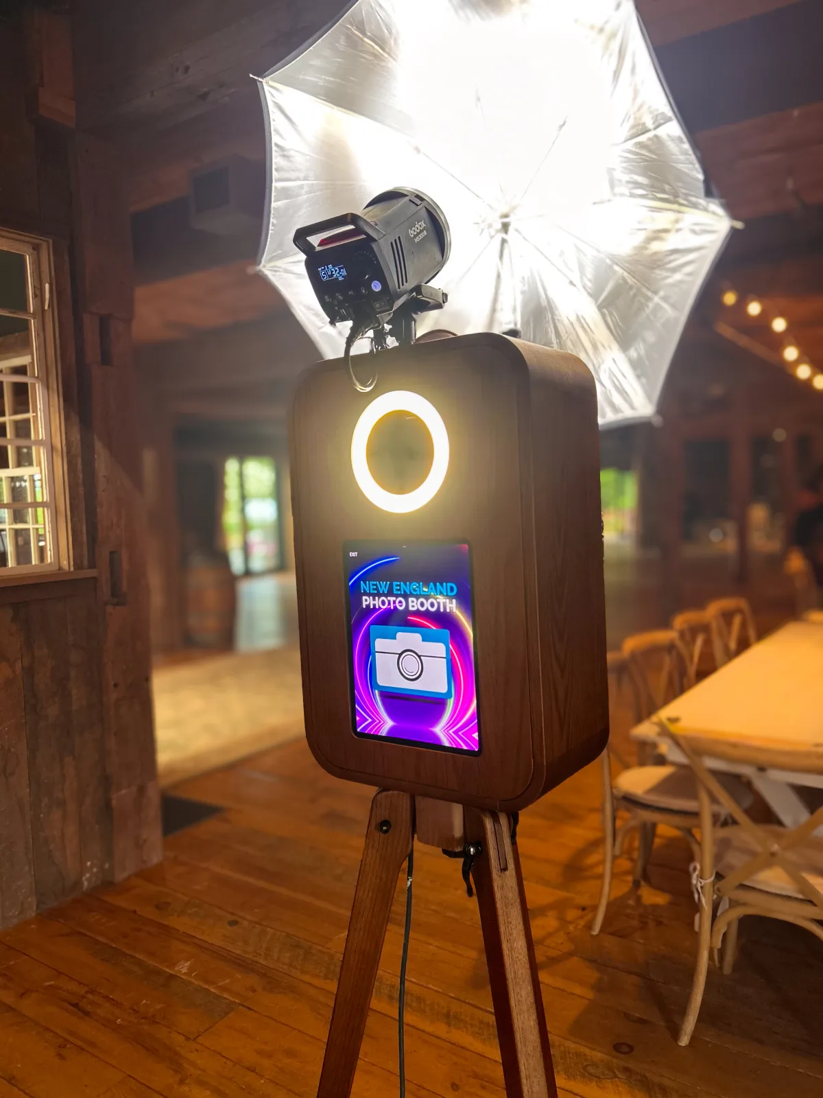 Flashback photo booth with vintage red oak wood exterior and touchscreen