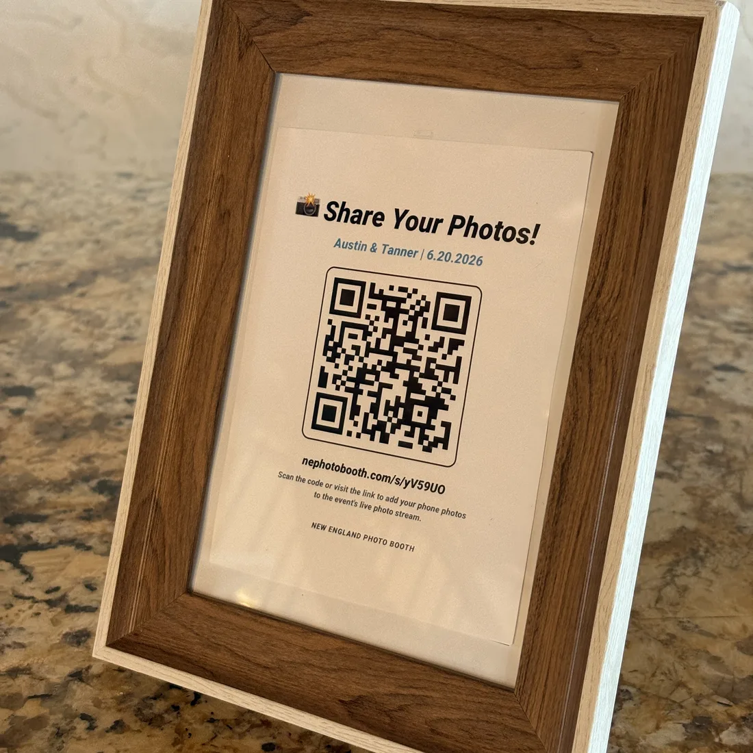 Framed GuestView Share Your Photos QR table sign at a reception