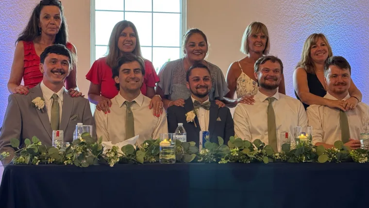 Wedding party seated at the head table