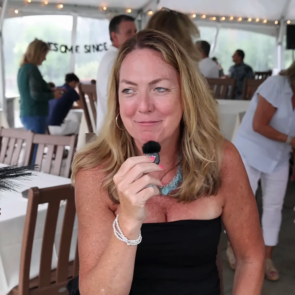 Guest laughing while recording a Confessional Booth video message