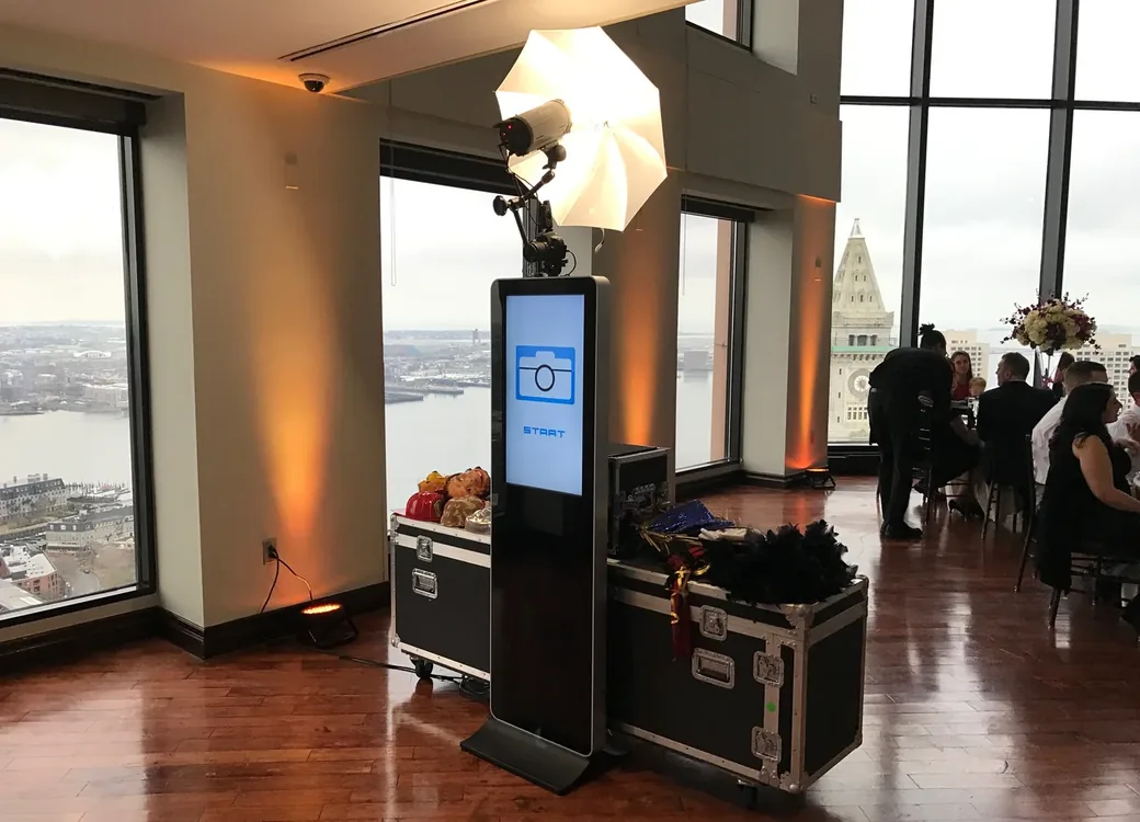 Photo Tower in use by couple with props at a wedding event