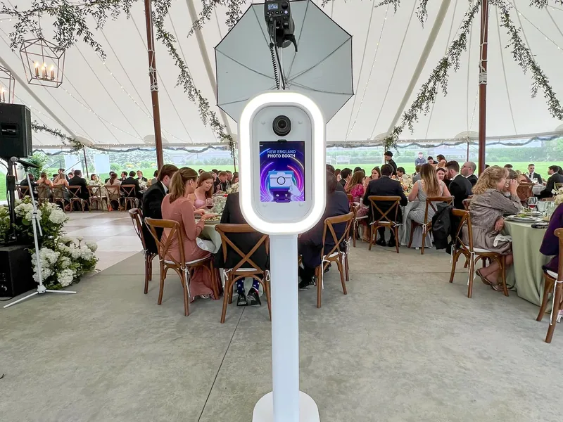 Guests enjoying the LuxPod at a wedding reception