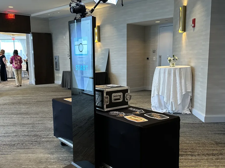 Guests using the Open Air Photo Tower at a wedding reception