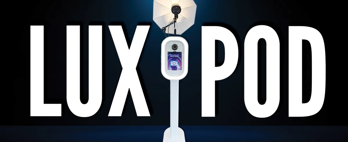 LuxPod photo booth set up at an event with LED ring light glowing